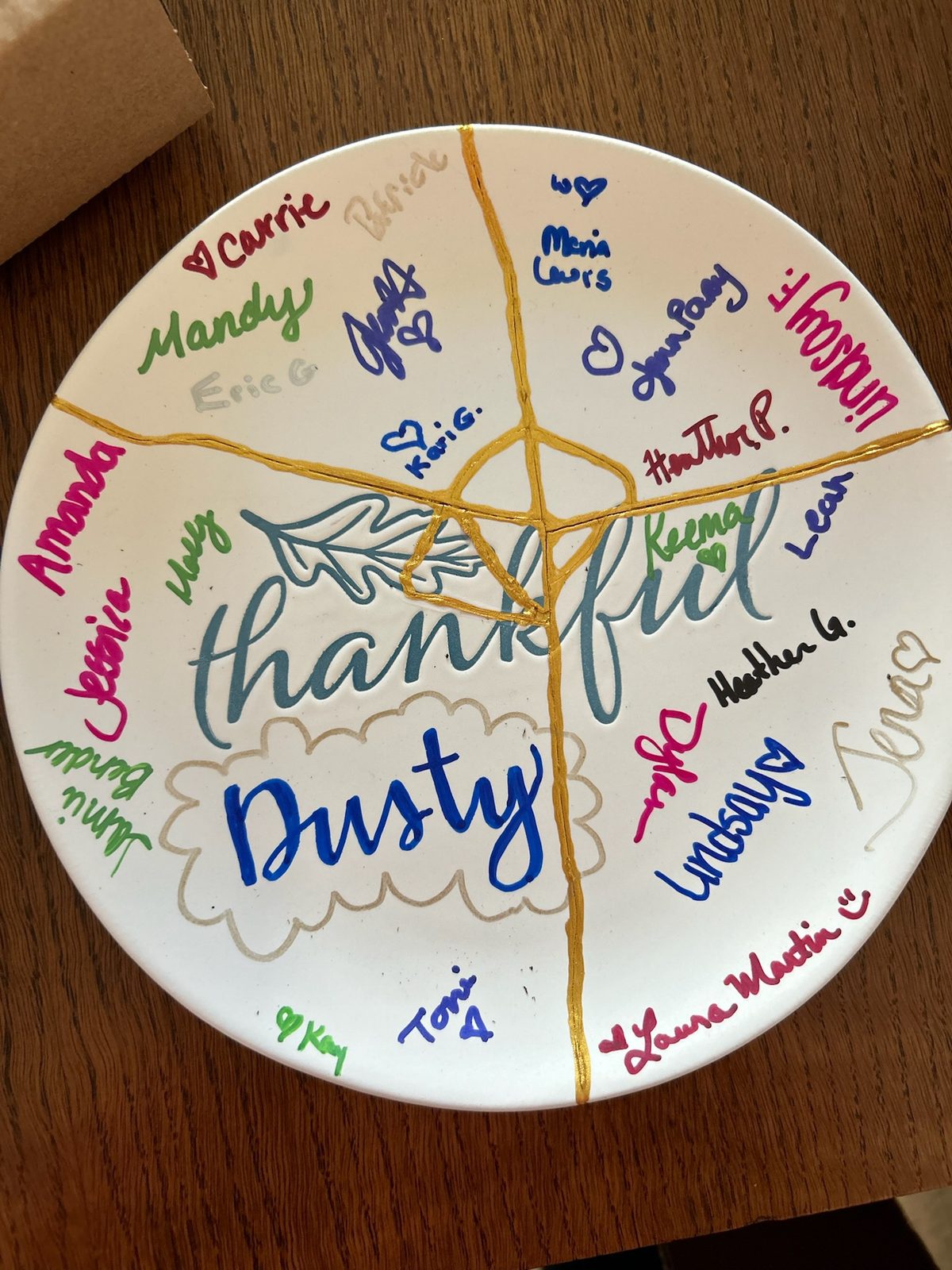 A thankful plate signed by retreat attendees